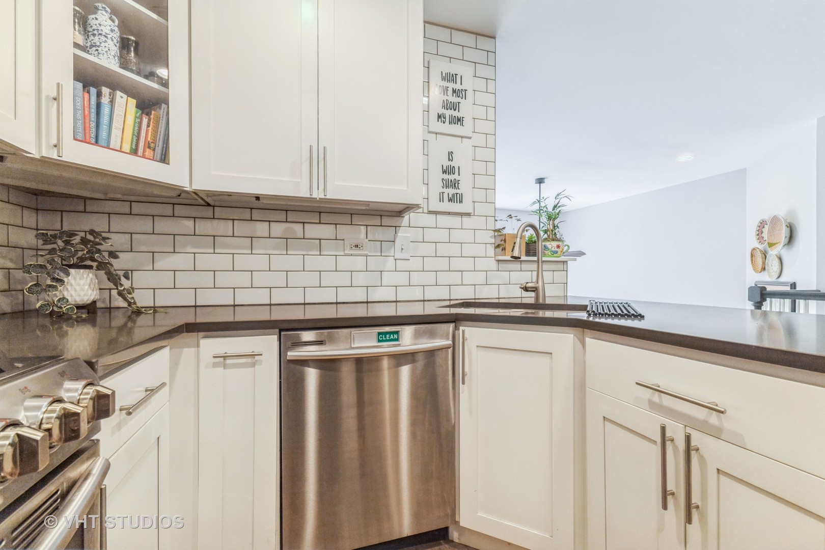 1328 South Federal Street, Unit G Chicago, IL 60605 - Photo 10 of 27 a kitchen with stainless steel appliances granite countertop a sink and cabinets