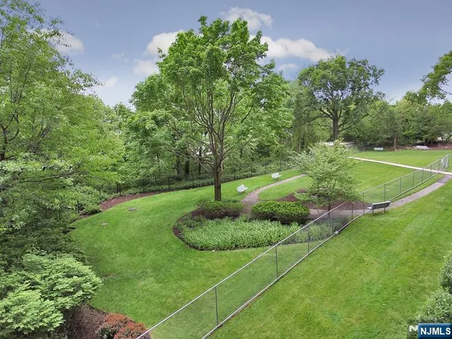 an outdoor sitting area with golf course