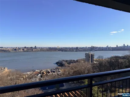 a view of a lake from a balcony