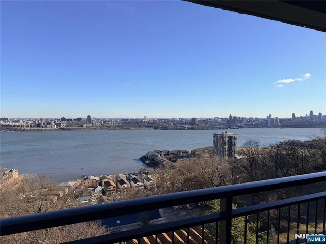 a view of a lake from a balcony