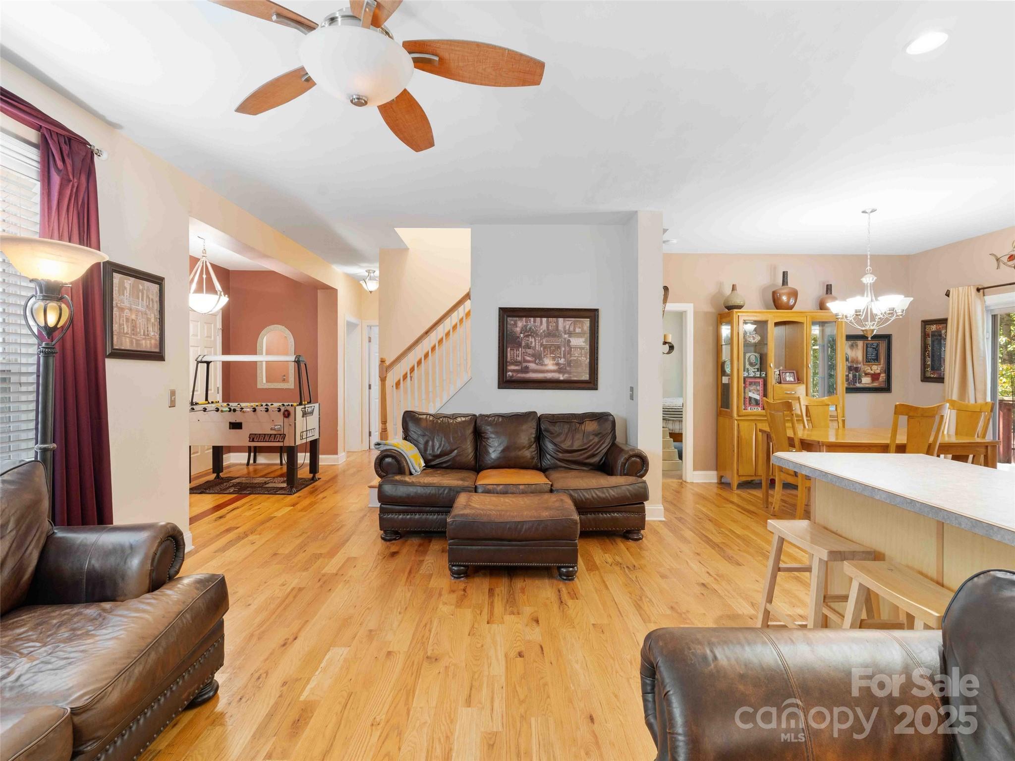 37 C Creek Lane Pisgah Forest, NC 28768 - Photo 11 of 34 a living room with furniture and a wooden floor