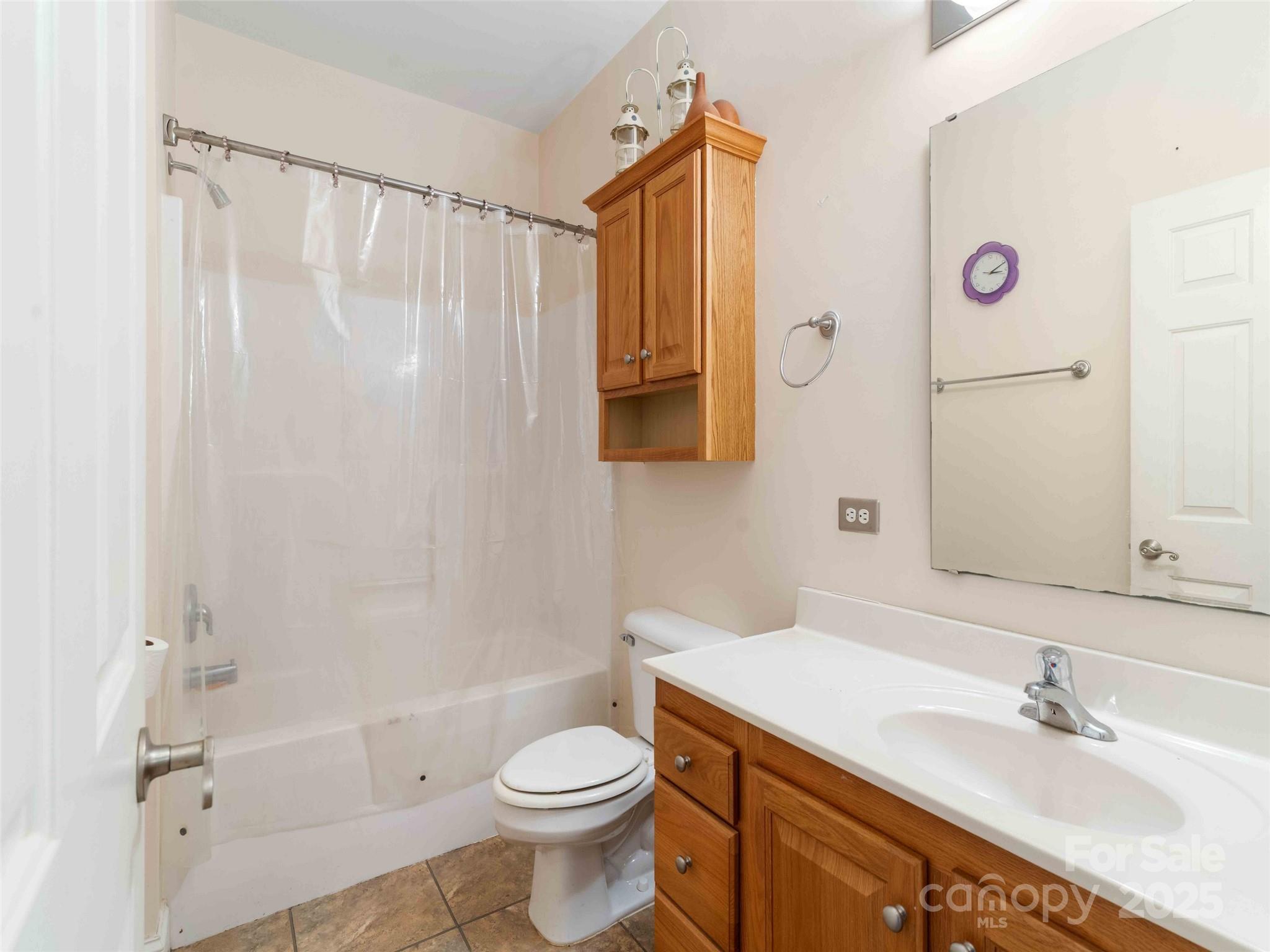 37 C Creek Lane Pisgah Forest, NC 28768 - Photo 14 of 34 a bathroom with a sink a toilet and shower