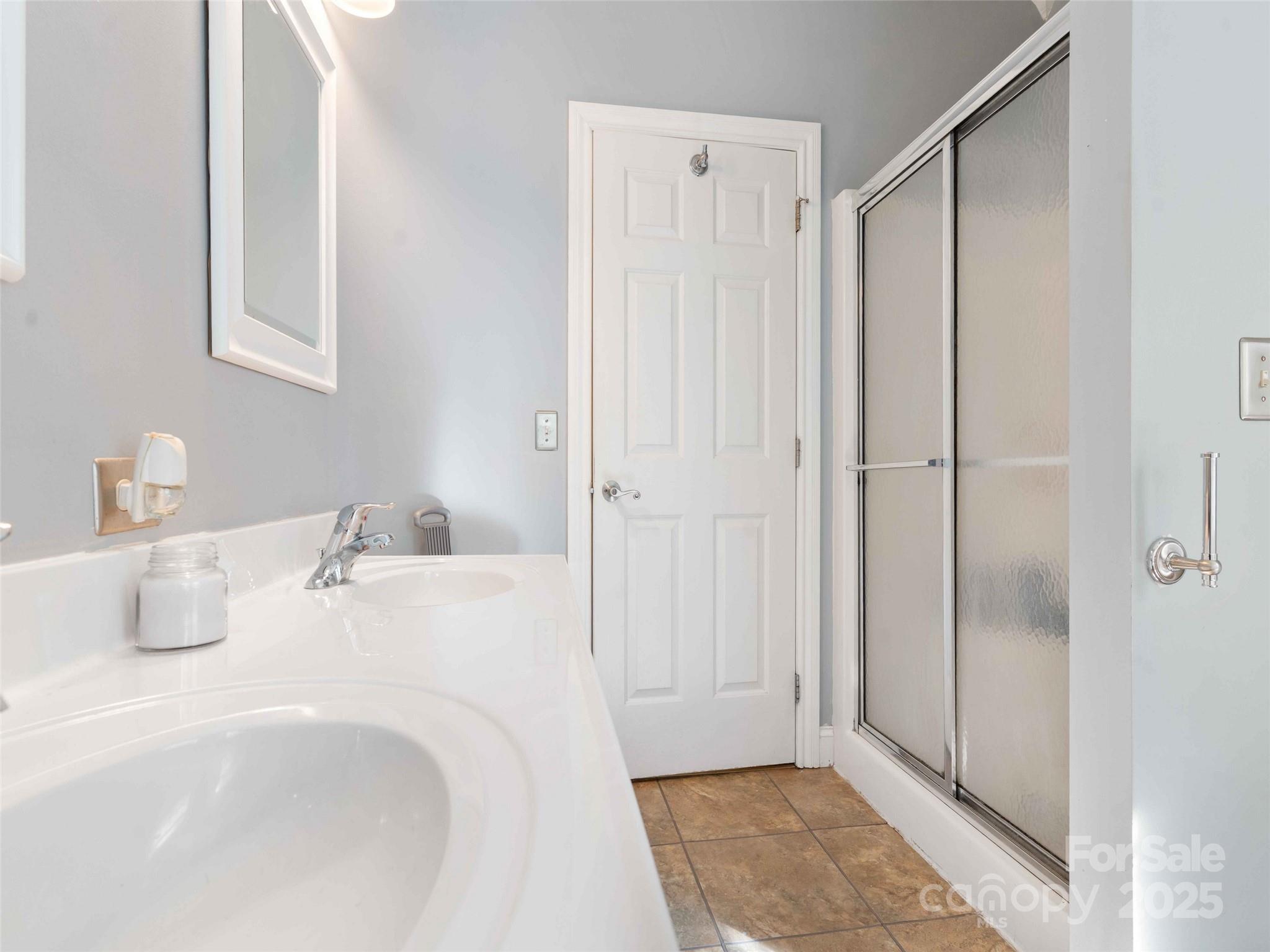 37 C Creek Lane Pisgah Forest, NC 28768 - Photo 20 of 34 a bathroom with a shower