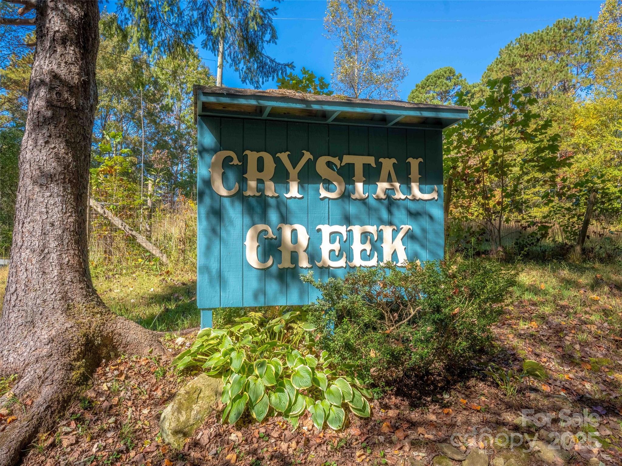 37 C Creek Lane Pisgah Forest, NC 28768 - Photo 34 of 34 a view of outdoor space with a sign broad