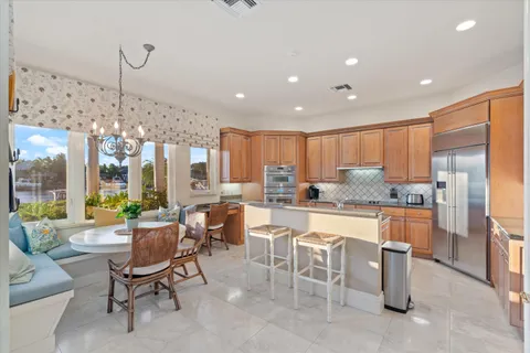 a dining room with furniture and entryway
