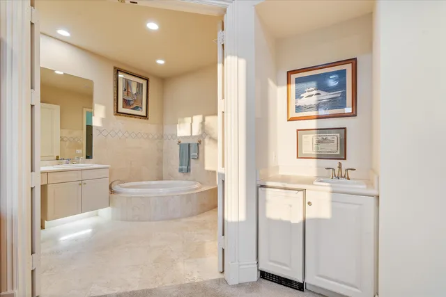 a view of a balcony with furniture and a floor to ceiling window