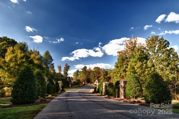 5125 Barrington Ridge Drive Indian Land, SC 29707 - Photo 7 of 18 a view of a street with a building in the background