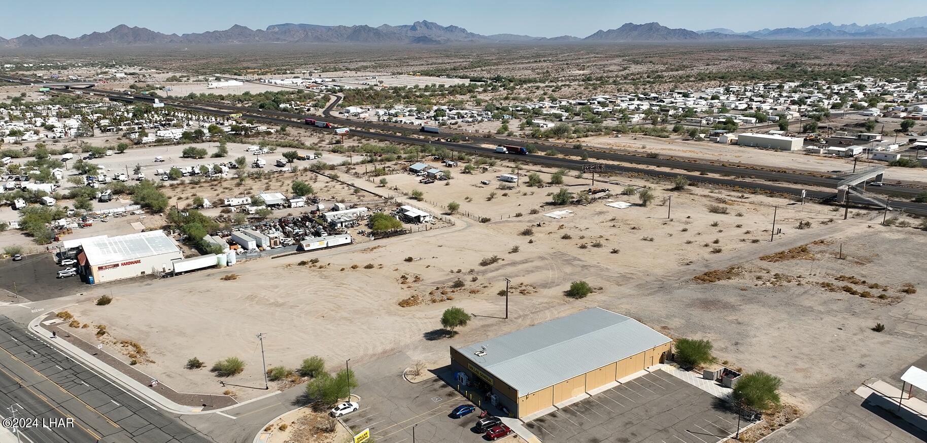 815 West Main Street Quartzsite, AZ 85346 - Photo 7 of 12 an aerial view of multiple house
