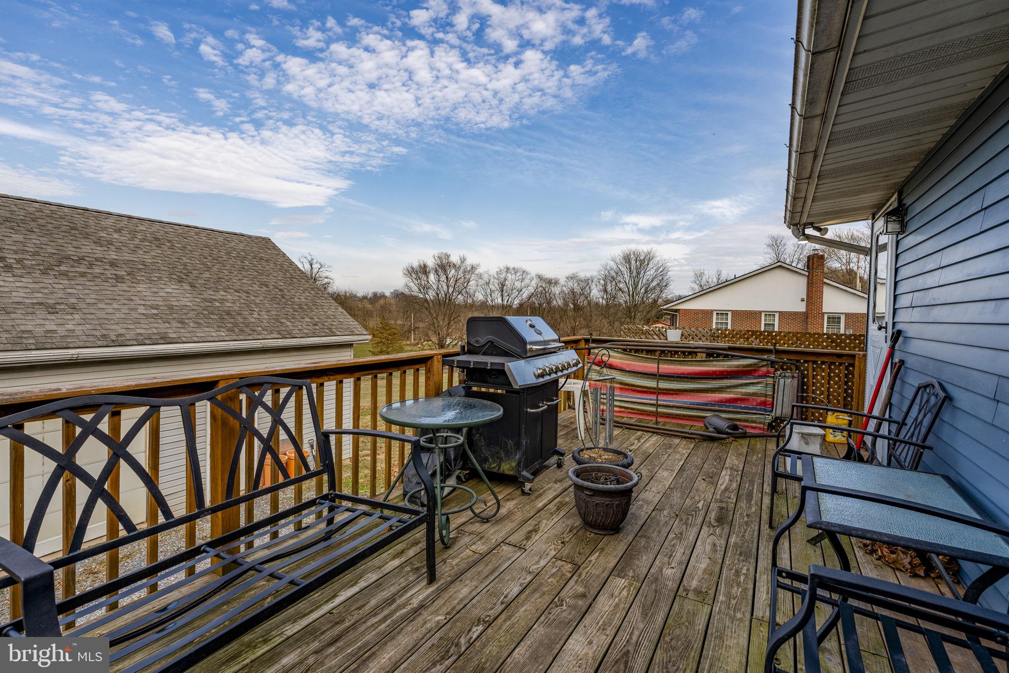 89 Cross Key Road Bernville, PA 19506 - Photo 14 of 20 a view of a balcony with chairs and wooden fence