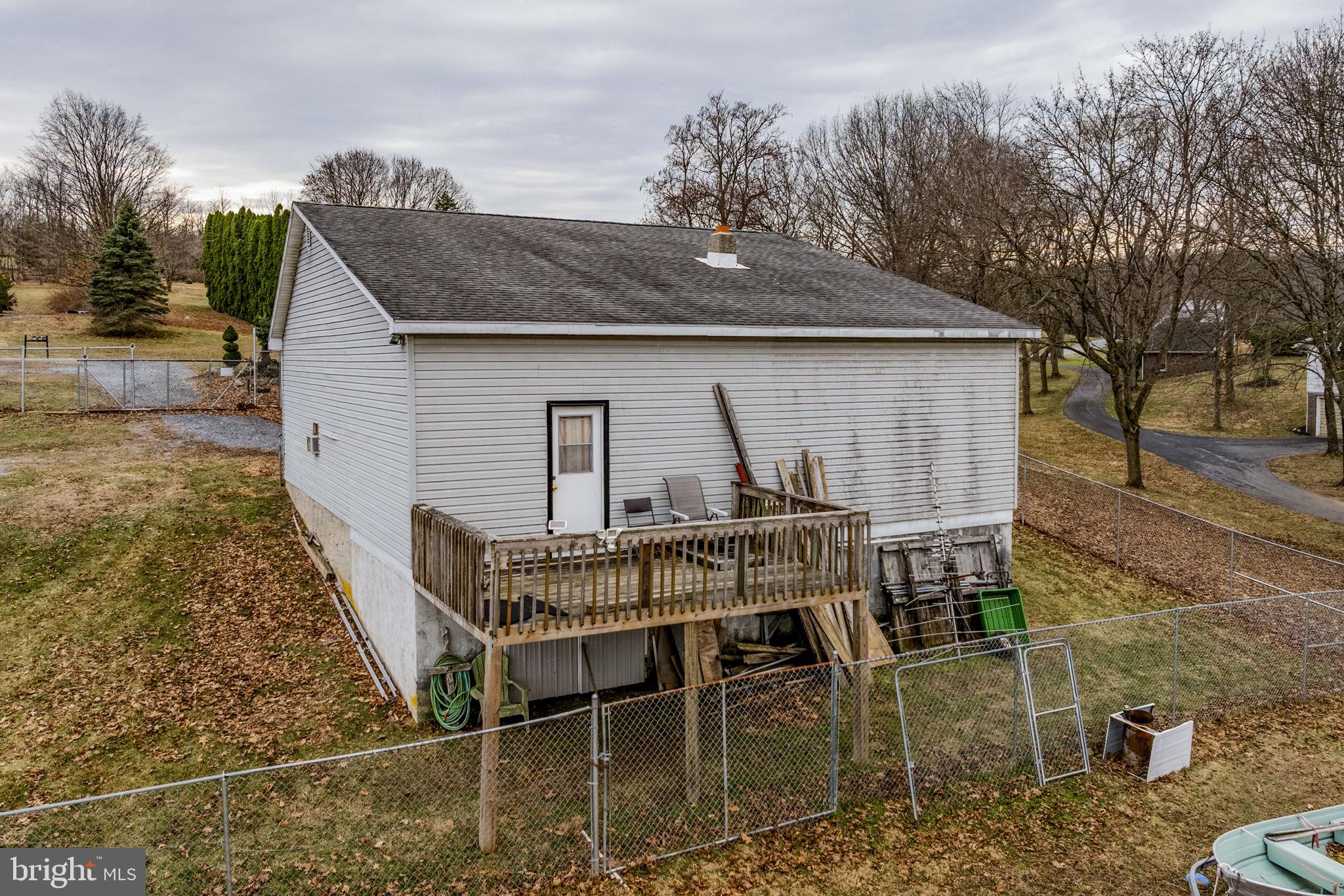 89 Cross Key Road Bernville, PA 19506 - Photo 17 of 20 a view of house with backyard and seating space