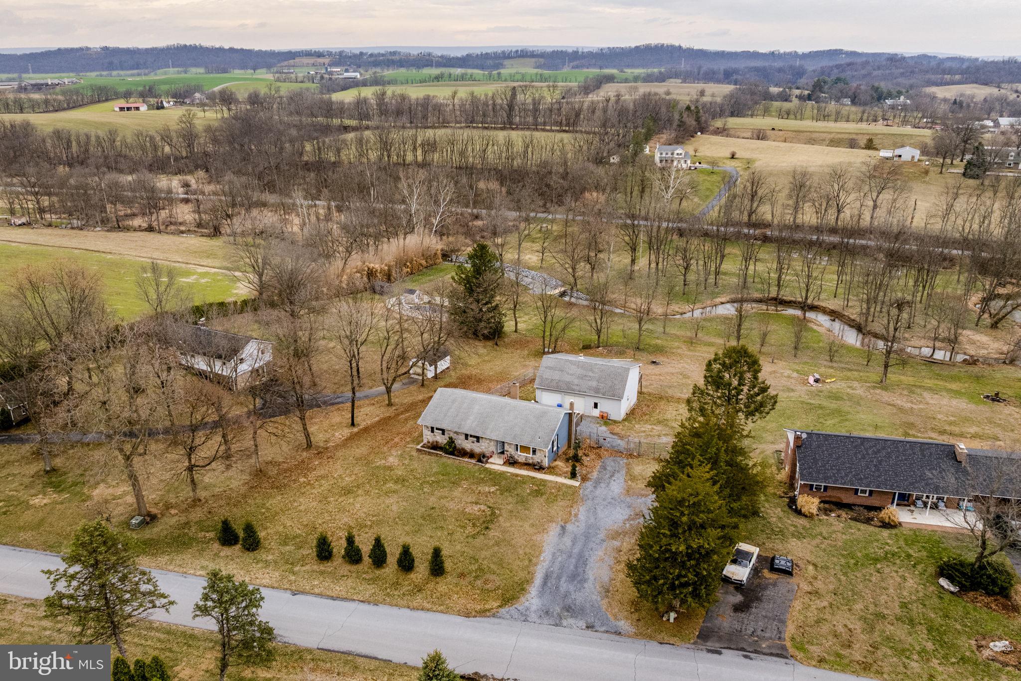 89 Cross Key Road Bernville, PA 19506 - Photo 3 of 20 an aerial view of a house with a lake view