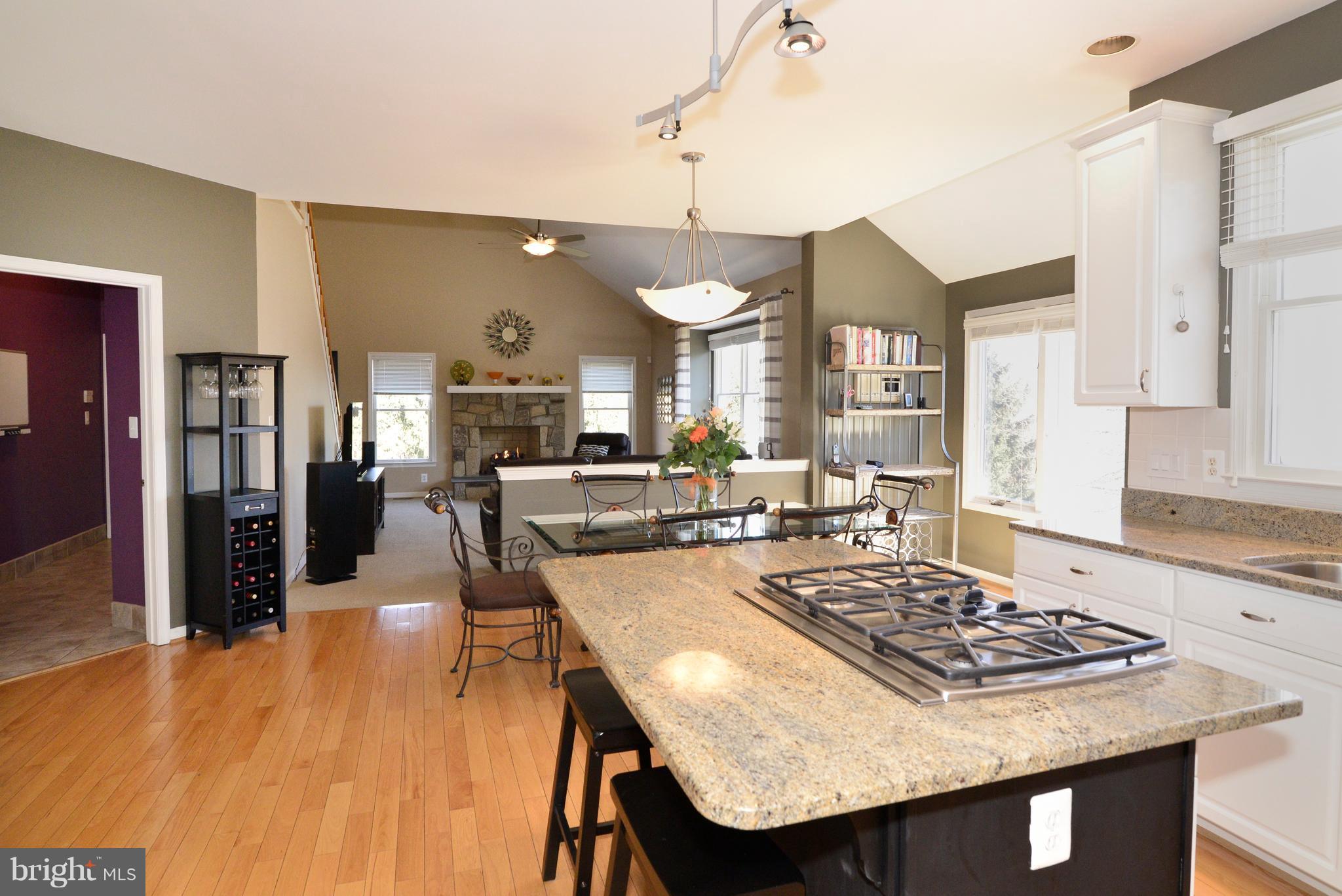 1343 Dasher Lane Reston, VA 20190 - Photo 5 of 30 The table-space kitchen opens to the family room.