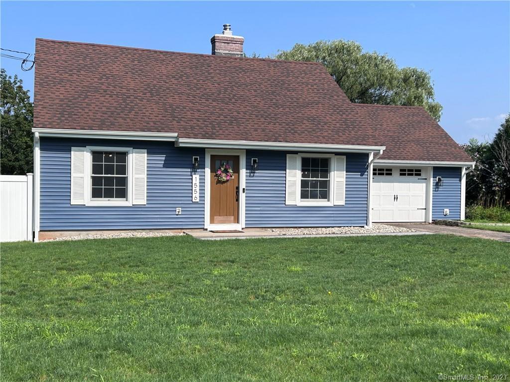 1556 North Street Suffield, CT 06078 - Photo 1 of 1 a front view of a house with a yard