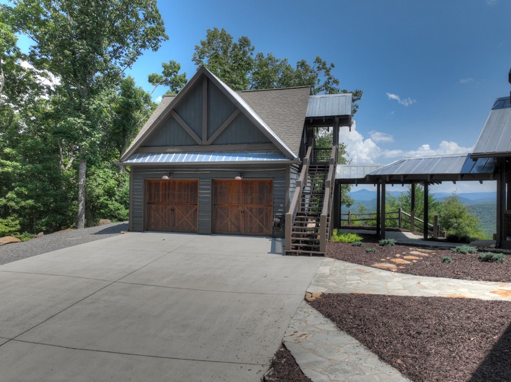 440 Cochise Road Cherry Log, GA 30522 - Photo 62 of 82 a front view of a house with garden