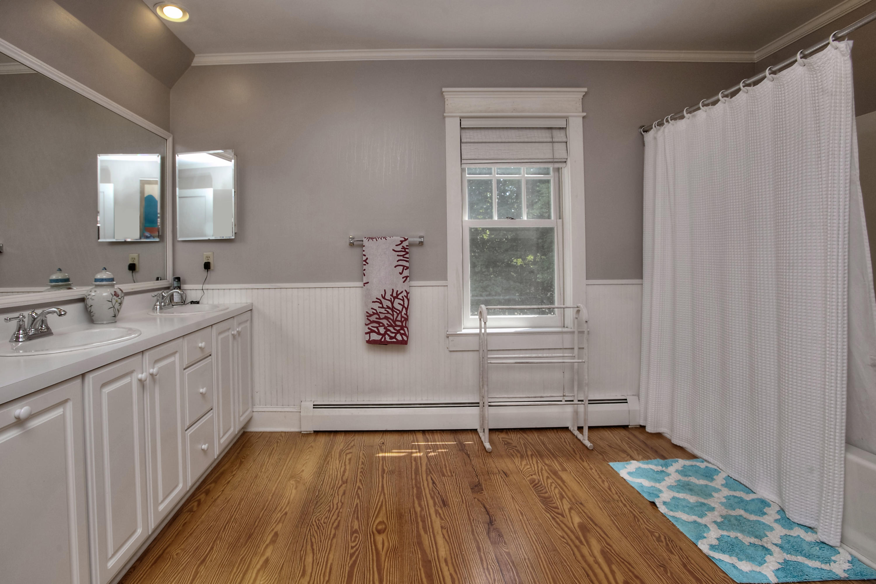 1006 Silvermine Road New Canaan, CT 06840 - Photo 26 of 39 a bathroom with a sink and a window