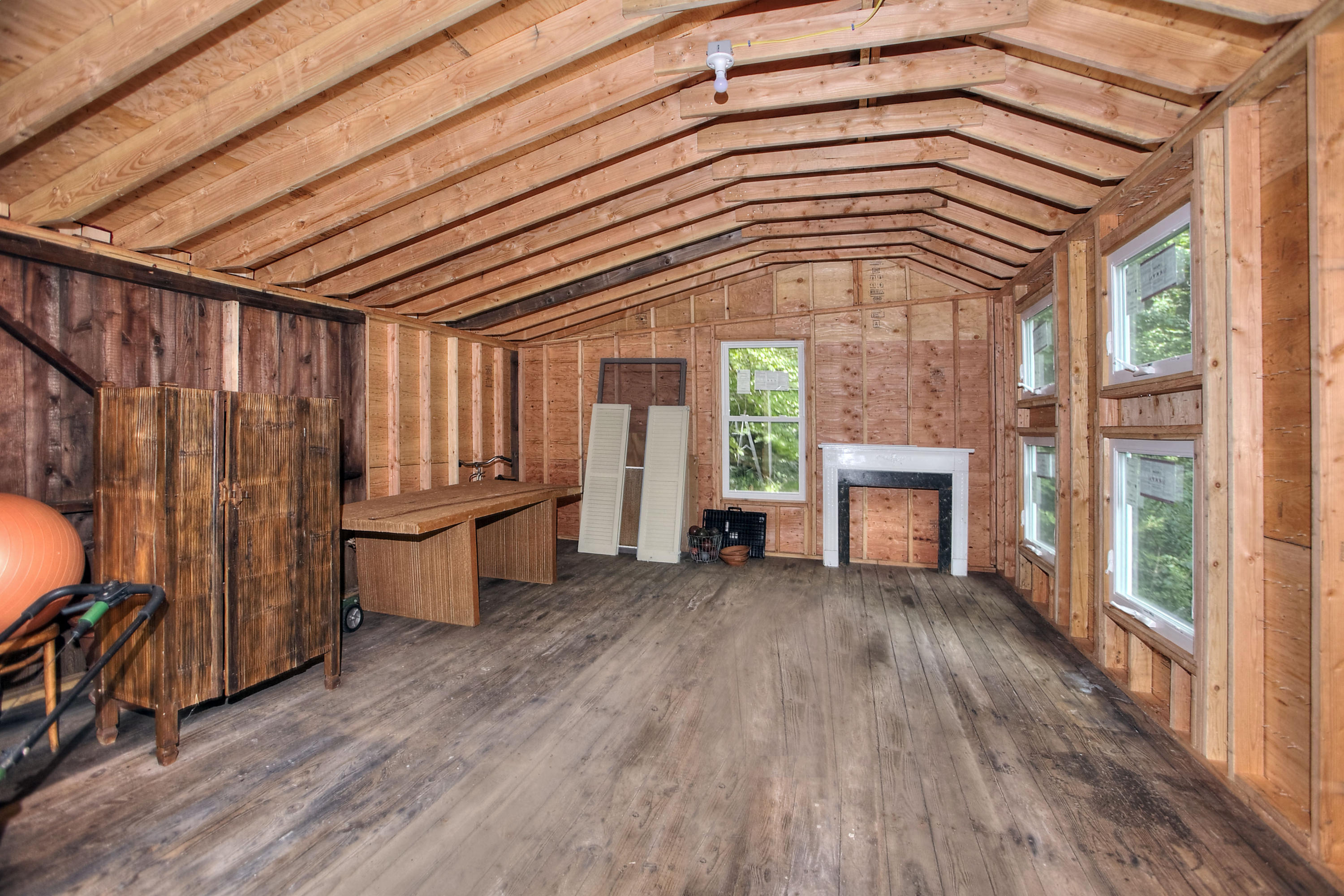 1006 Silvermine Road New Canaan, CT 06840 - Photo 31 of 39 wooden floor in an empty room with a fireplace