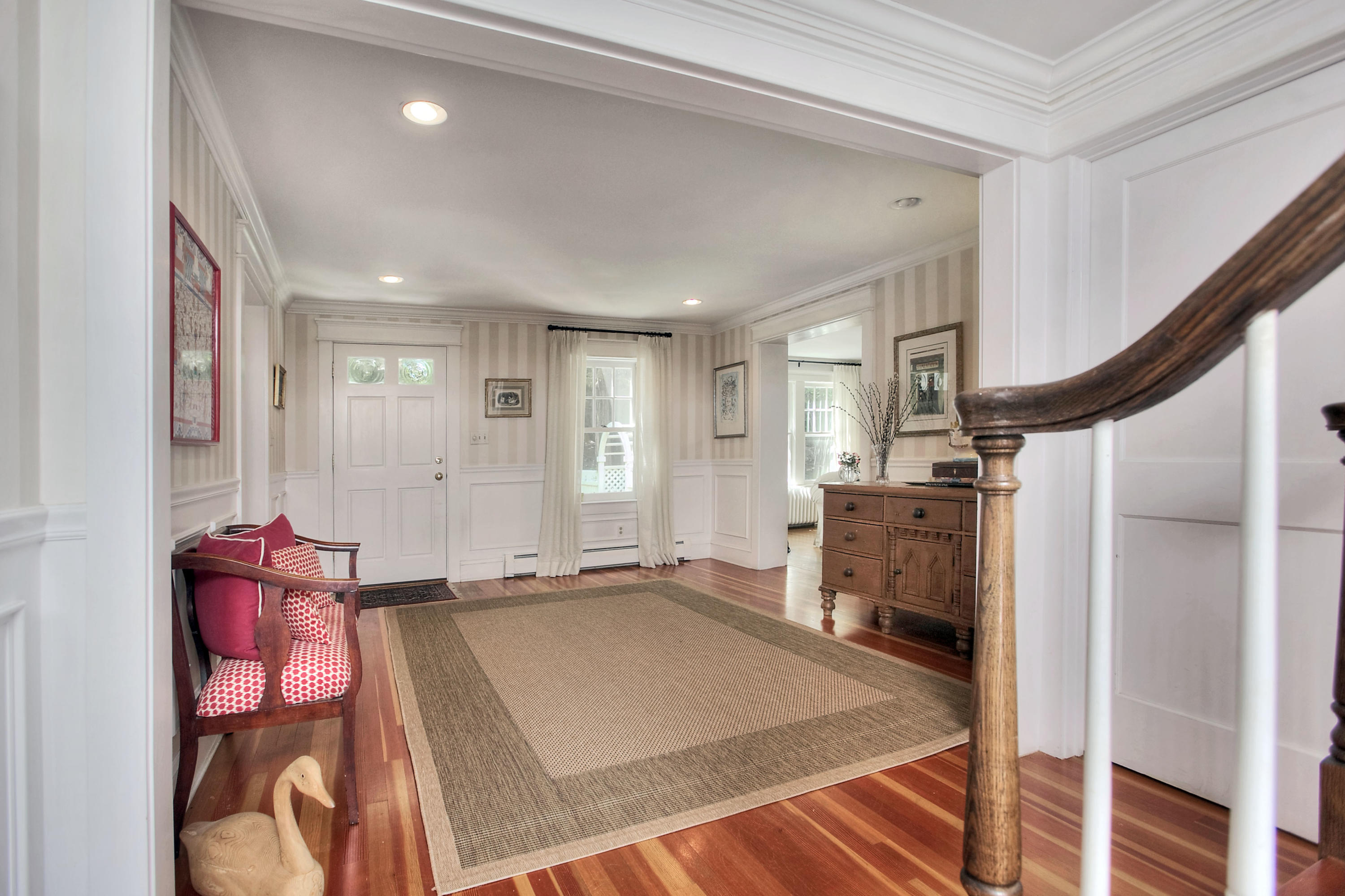 1006 Silvermine Road New Canaan, CT 06840 - Photo 4 of 39 a spacious bedroom with a bed and cabinets