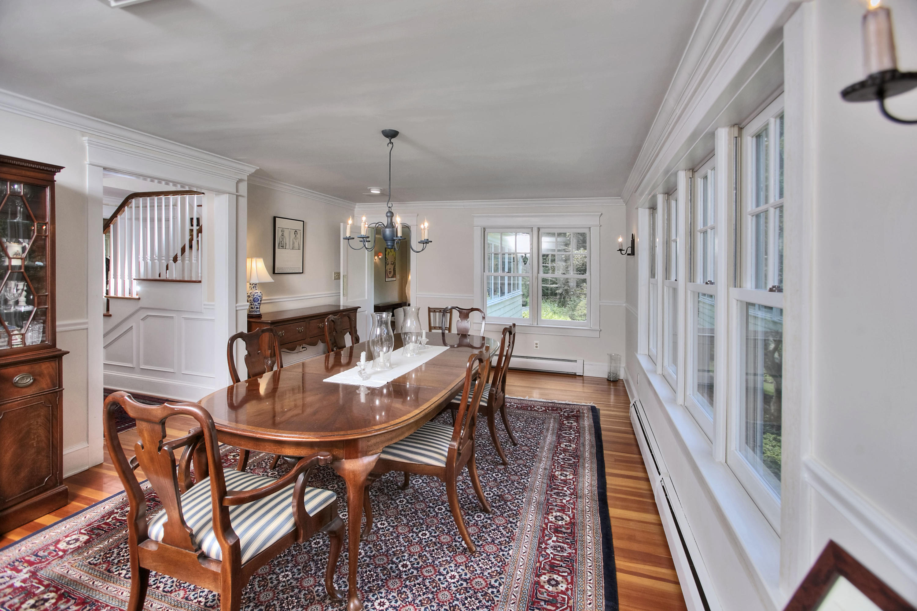 1006 Silvermine Road New Canaan, CT 06840 - Photo 8 of 39 a view of a dining room with furniture window and wooden floor