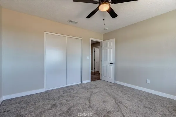 a bathroom with a sink and cabinets