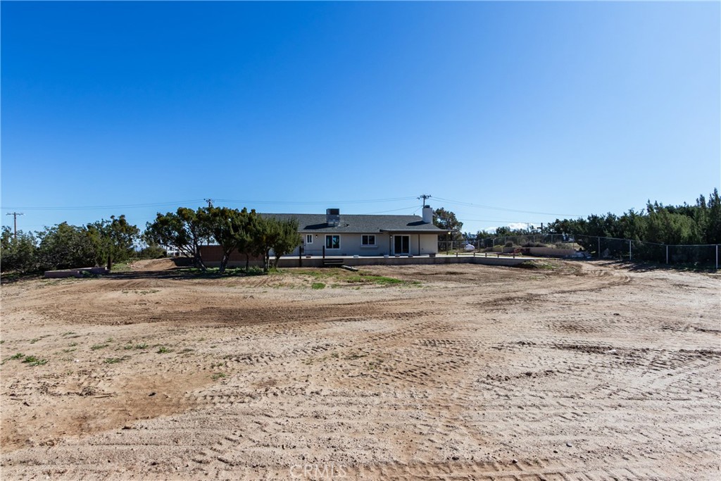 6572 Merced Road Oak Hills, CA 92344 - Photo 54 of 62 a view of a lake with beach
