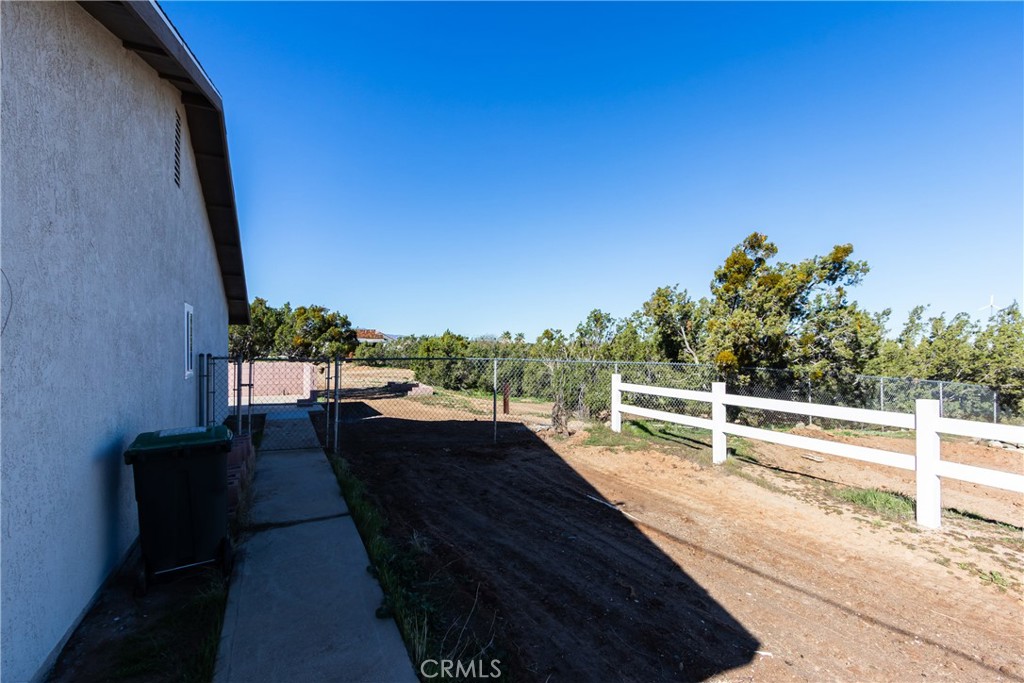 6572 Merced Road Oak Hills, CA 92344 - Photo 62 of 62 a view of balcony with furniture