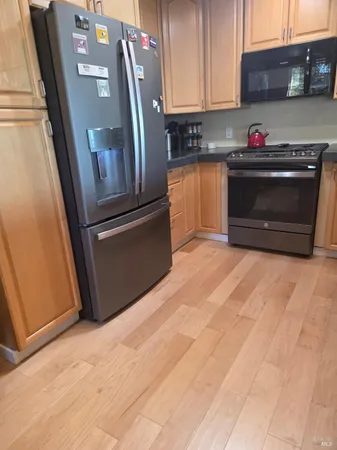 a view of two door and a window