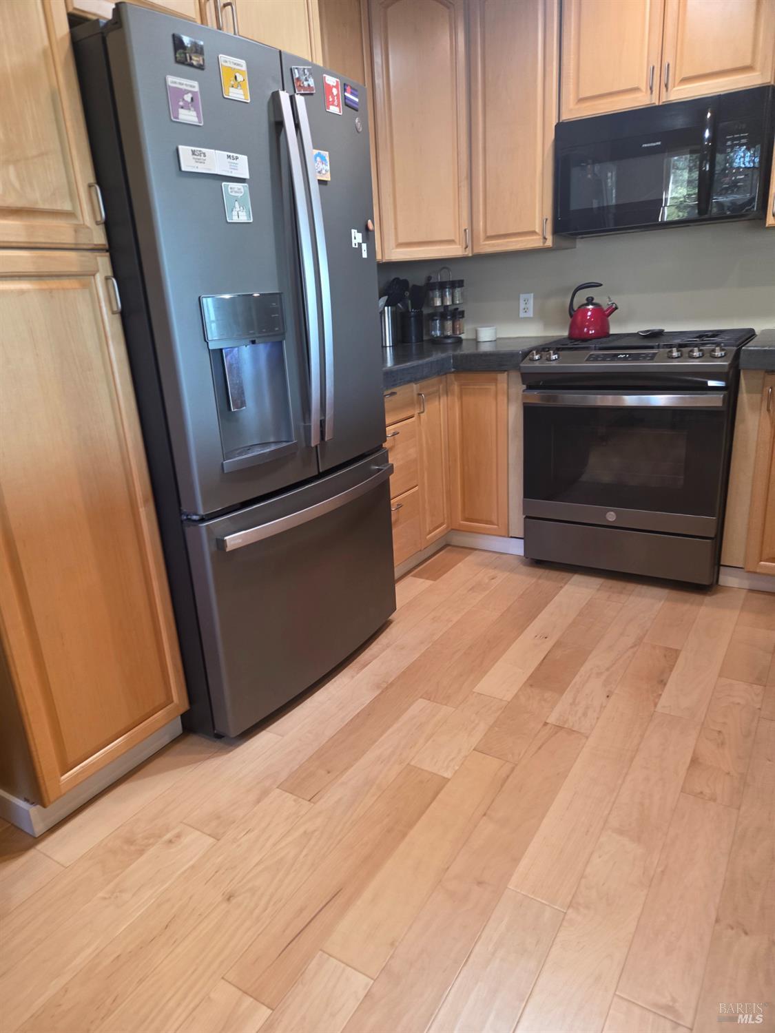 460 Bella Vista Drive Angwin, CA 94508 - Photo 23 of 73 a kitchen with stainless steel appliances granite countertop a refrigerator and a sink