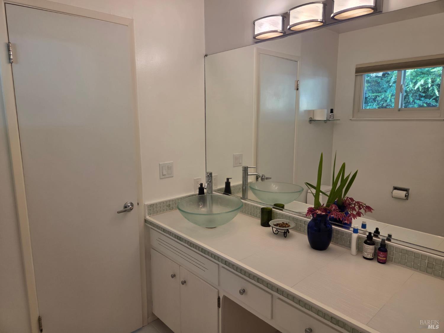 460 Bella Vista Drive Angwin, CA 94508 - Photo 31 of 73 a bathroom with a sink a vanity and a mirror