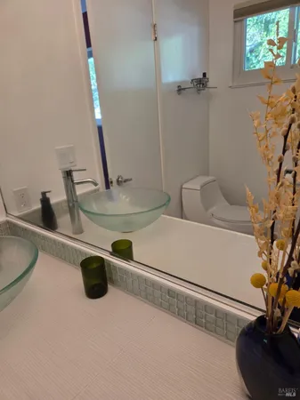 a bathroom with a toilet and a bathtub