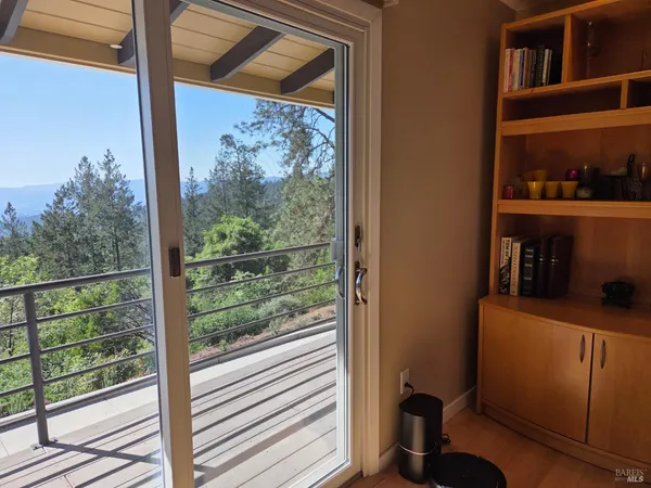 a kitchen with a stove and a refrigerator