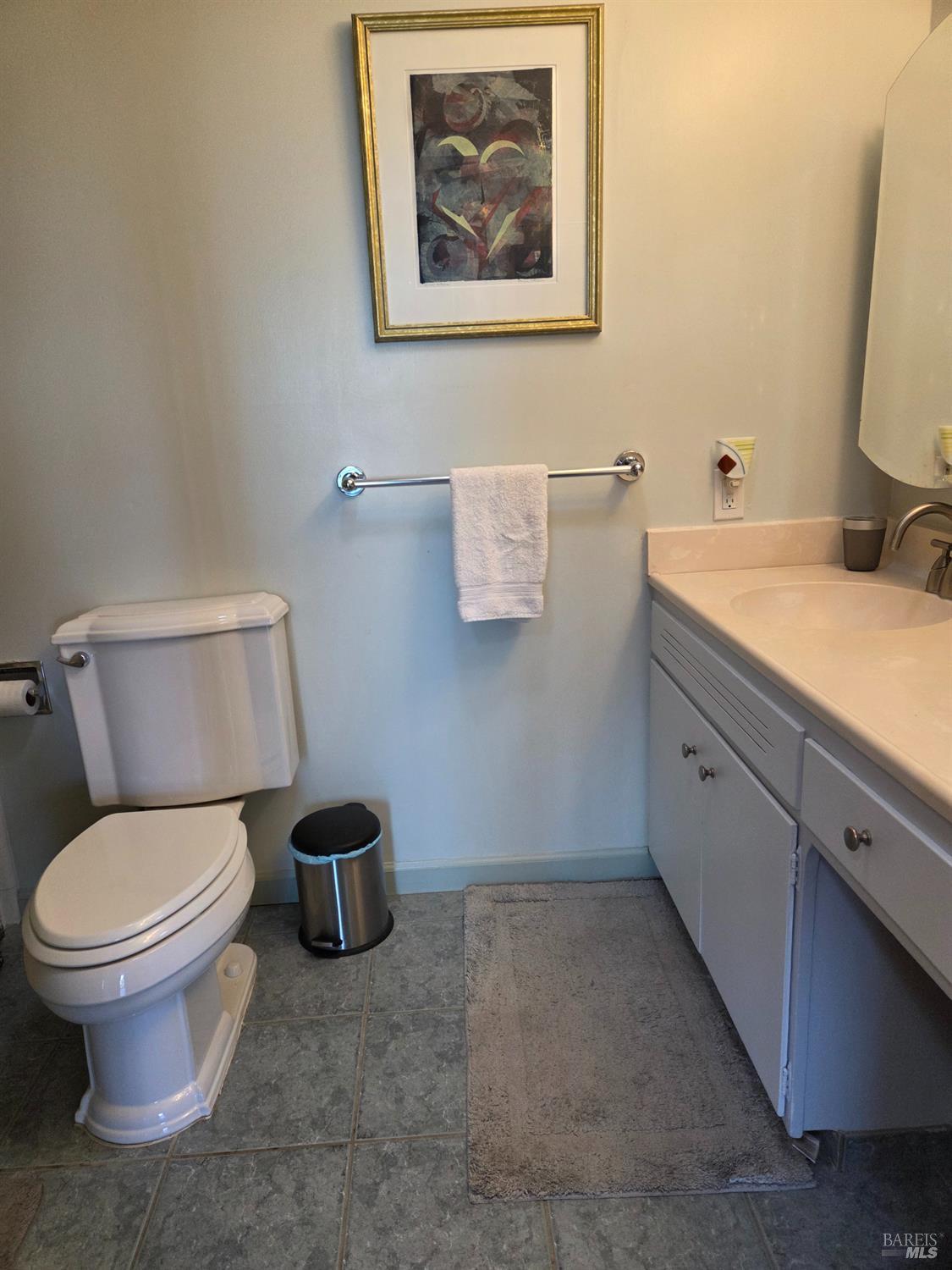 460 Bella Vista Drive Angwin, CA 94508 - Photo 44 of 73 a bathroom with a toilet sink and mirror