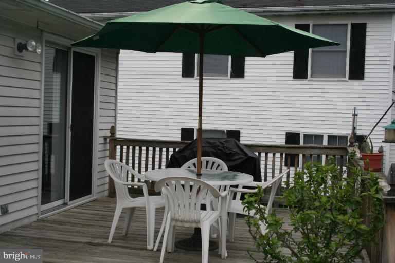 5727 Van Dyke Road Baltimore, MD 21206 - Photo 15 of 21 Enjoy the deck adjacent to the pool