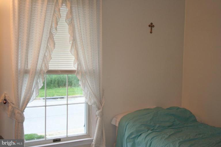 5727 Van Dyke Road Baltimore, MD 21206 - Photo 17 of 21 Neutral third bedroom