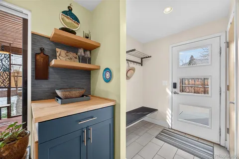 a bedroom with a bed and cabinets