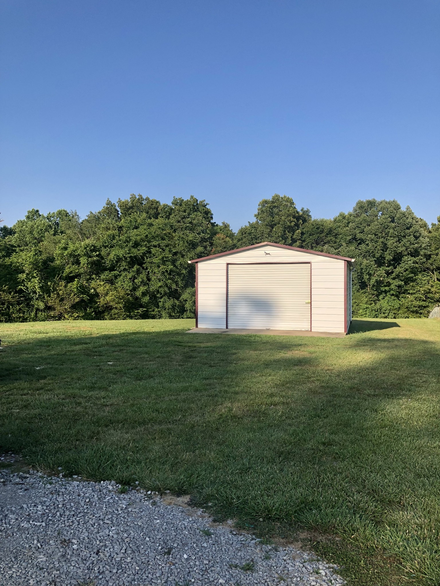 1075 Oak Grove Road Goodspring, TN 38460 - Photo 11 of 38 a view of a garden with a house