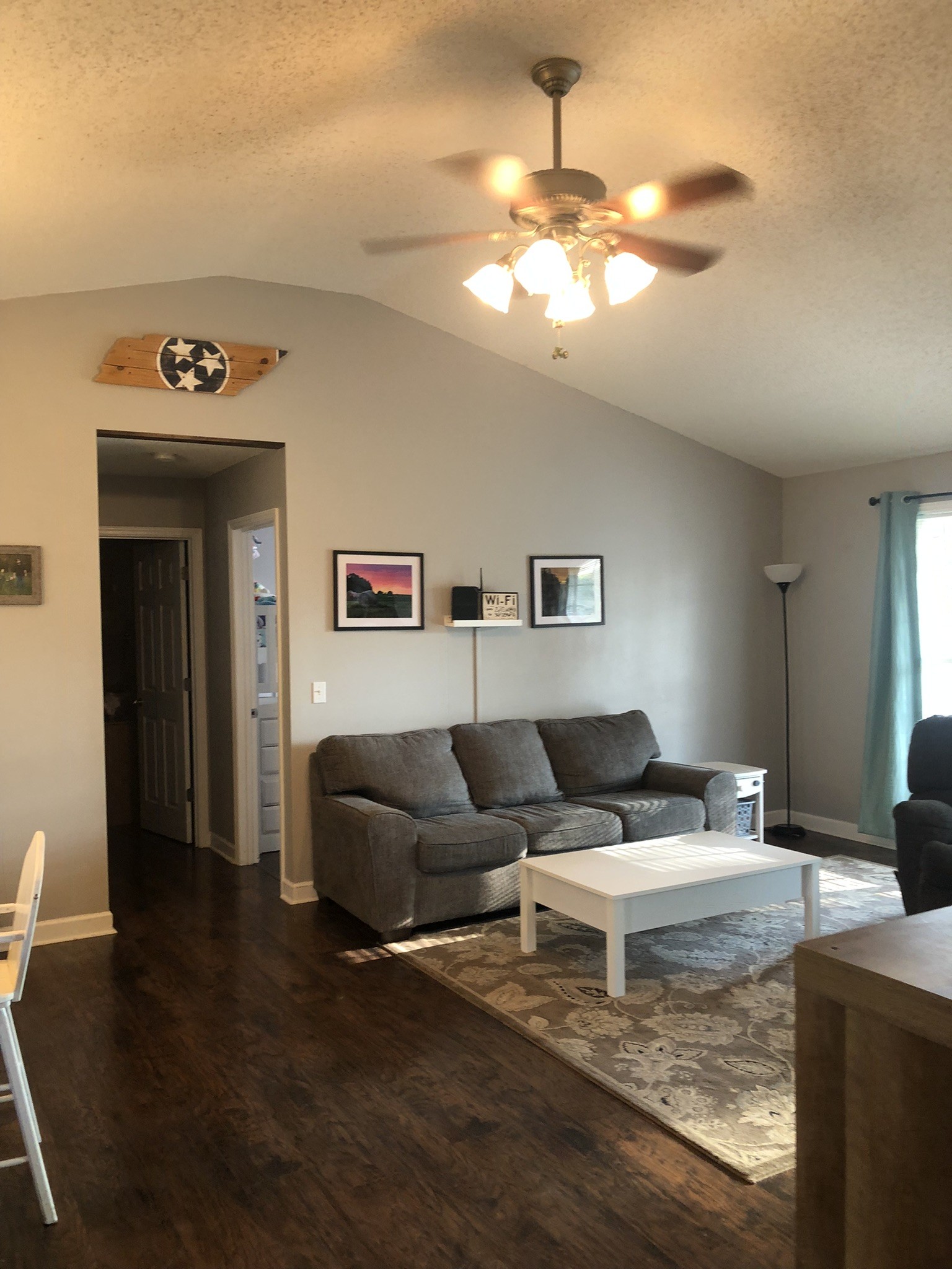 1075 Oak Grove Road Goodspring, TN 38460 - Photo 23 of 38 a living room with furniture and a chandelier