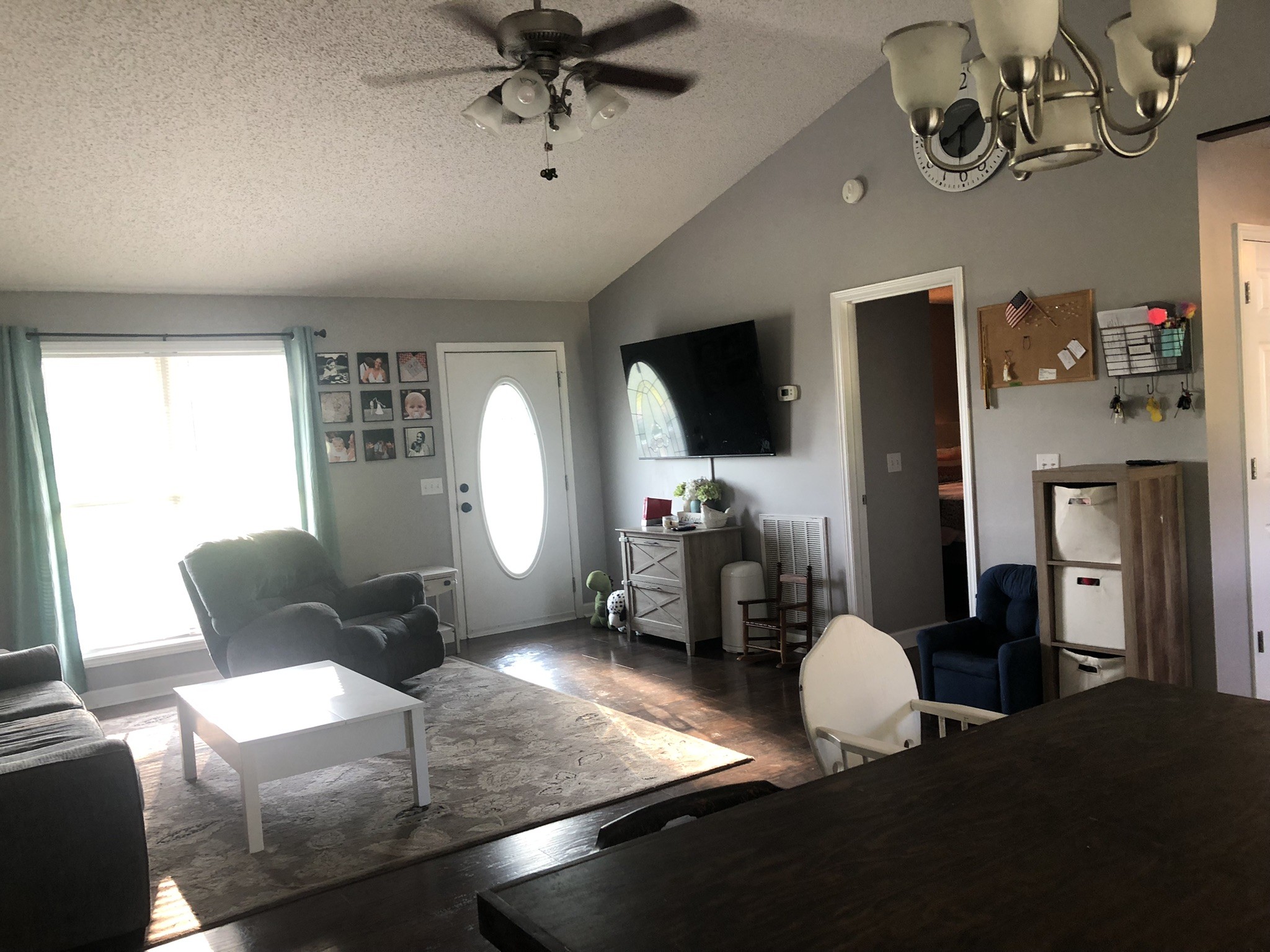 1075 Oak Grove Road Goodspring, TN 38460 - Photo 26 of 38 a living room with furniture a flat screen tv and a window