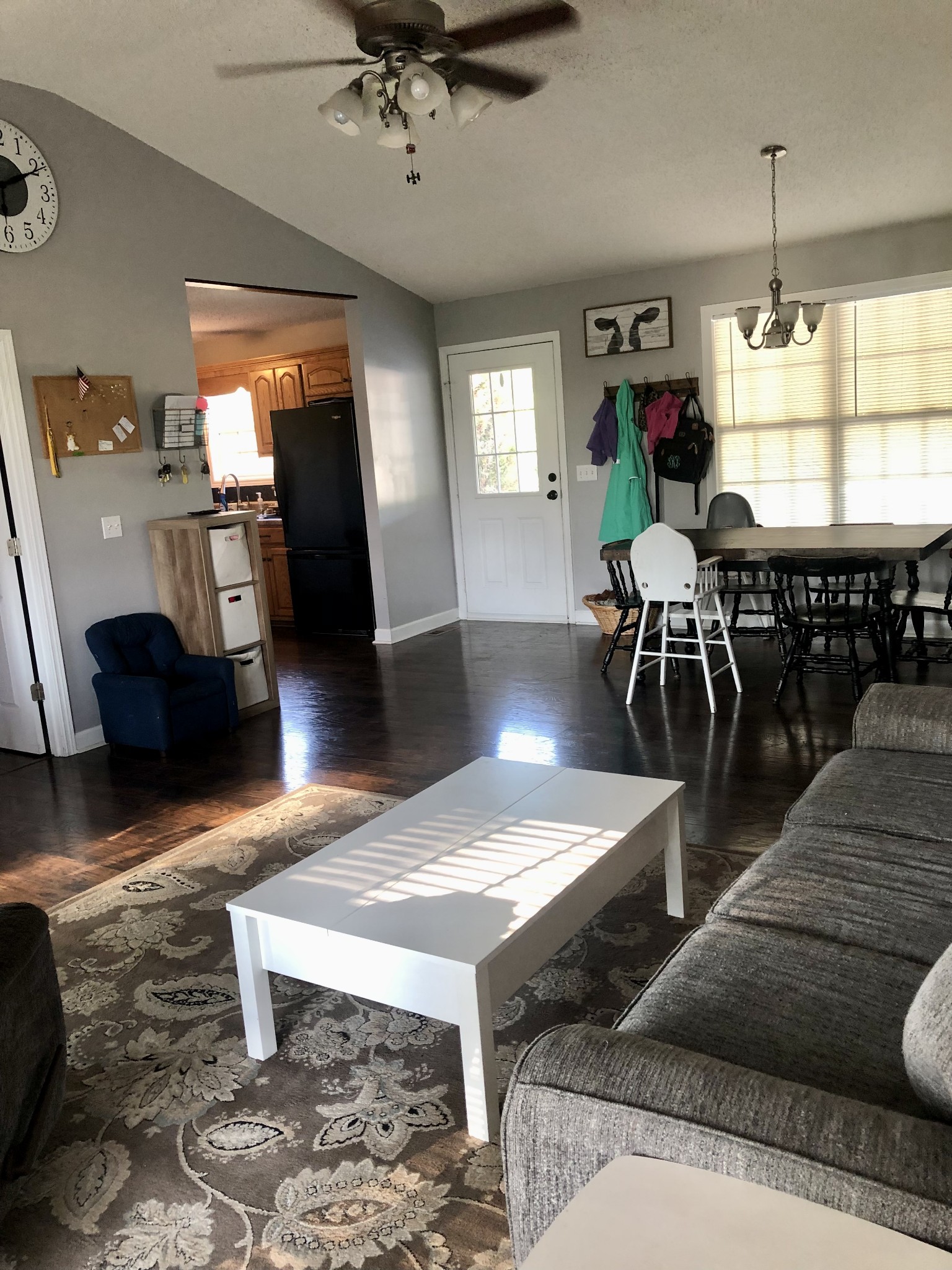 1075 Oak Grove Road Goodspring, TN 38460 - Photo 27 of 38 a living room with couches and dining table with wooden floor