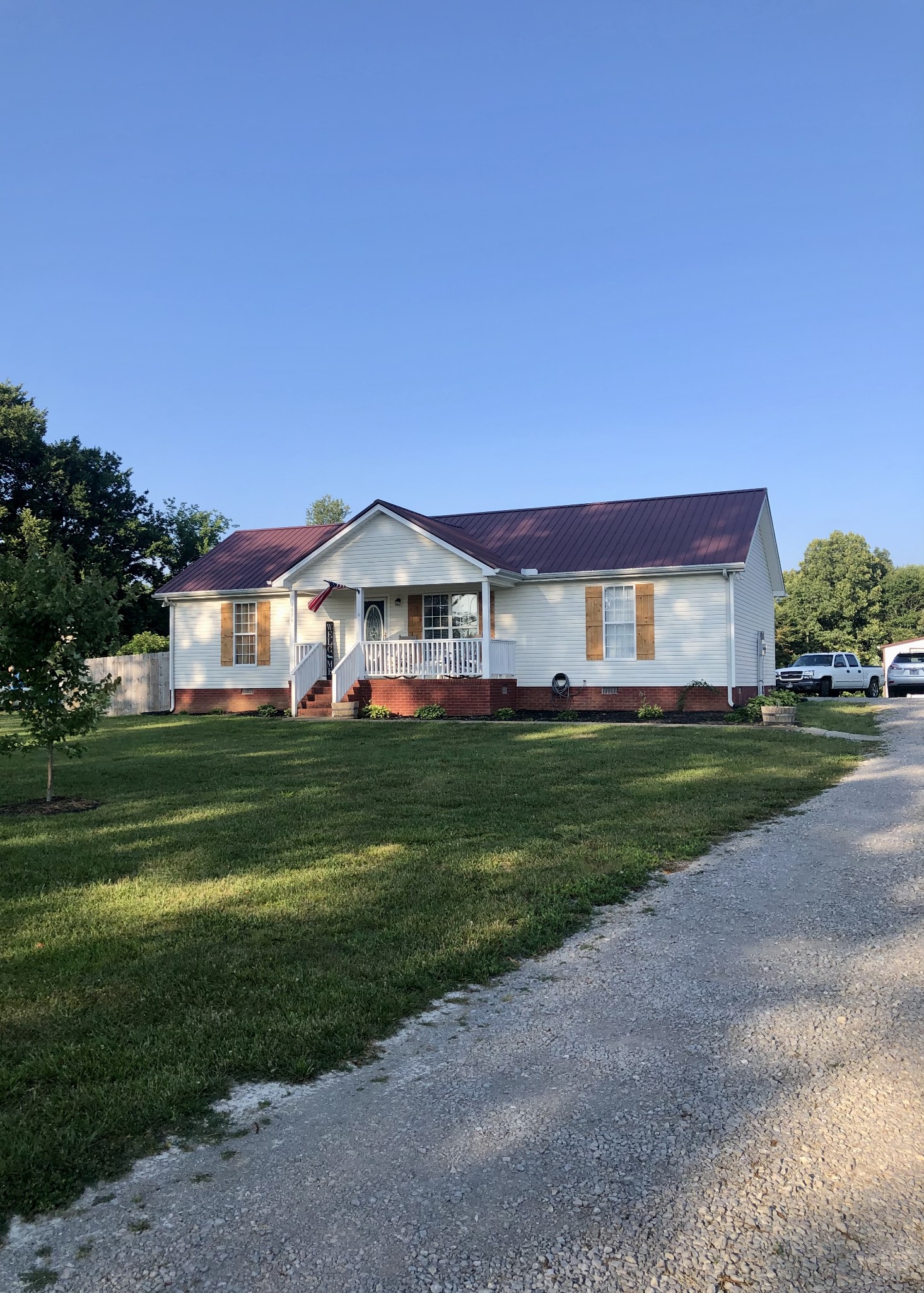 1075 Oak Grove Road Goodspring, TN 38460 - Photo 3 of 38 a front view of a house with a yard