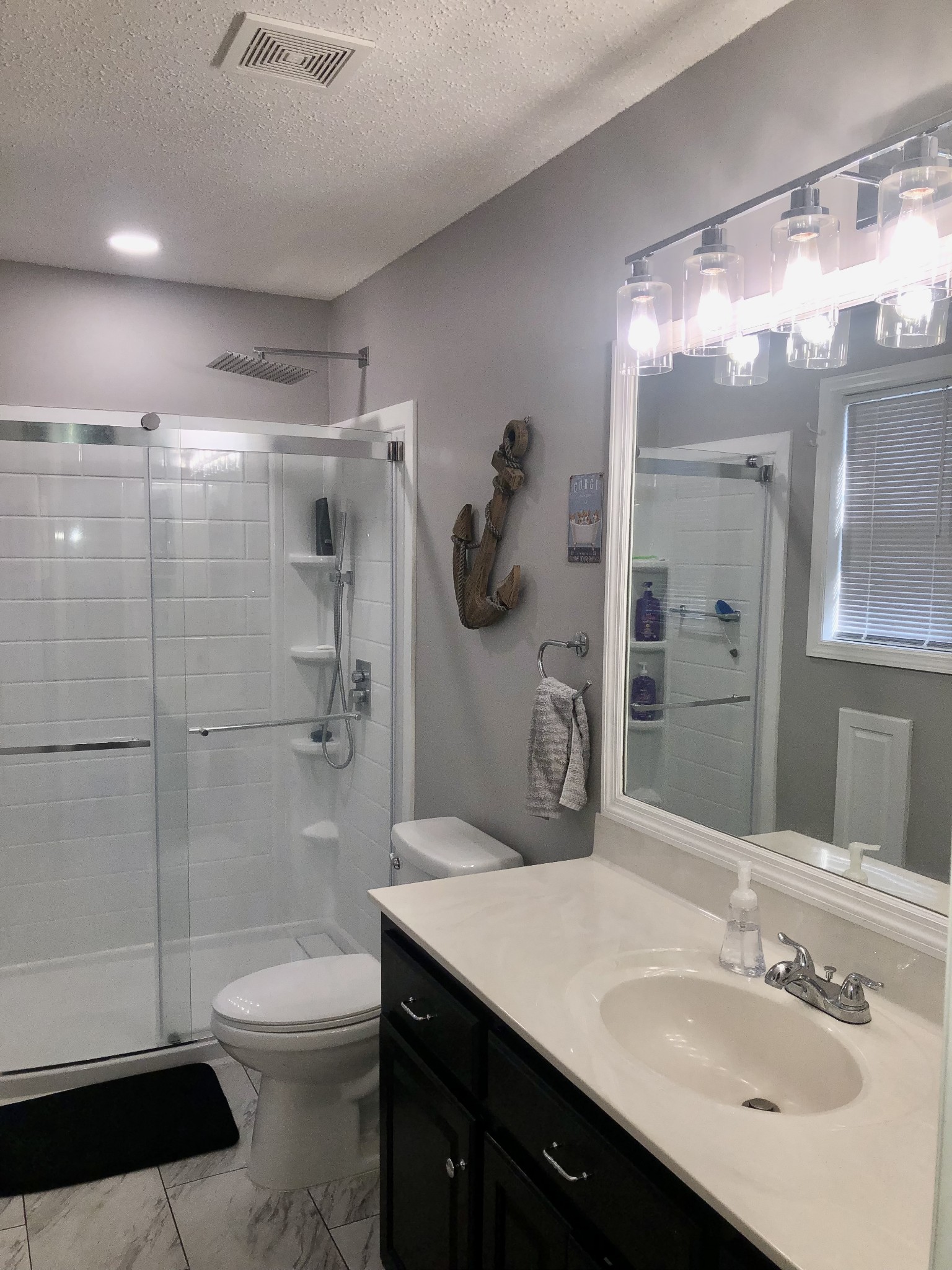 1075 Oak Grove Road Goodspring, TN 38460 - Photo 33 of 38 a bathroom with a sink a toilet and shower