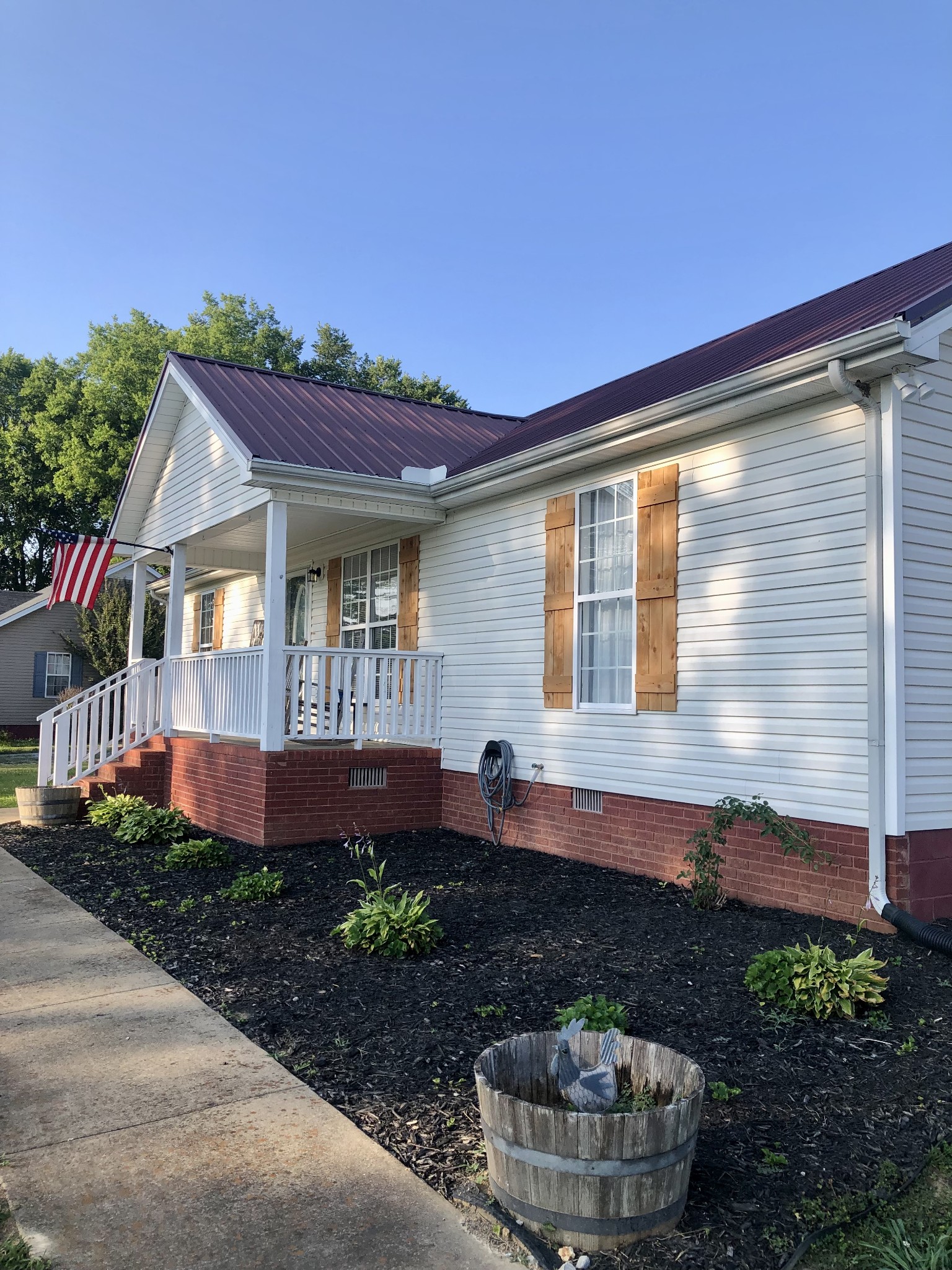 1075 Oak Grove Road Goodspring, TN 38460 - Photo 10 of 38 a front view of a house with garden