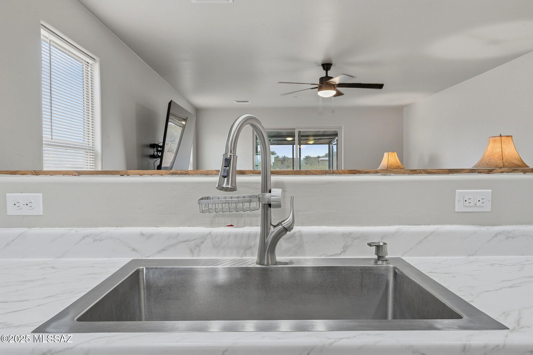 1458 North Wentworth Road Vail, AZ 85641 - Photo 29 of 44 a view closed with a sink and chandelier