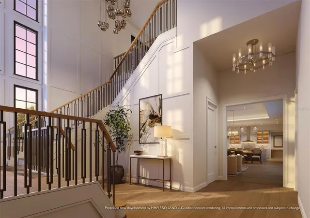 a view of hall way with furniture