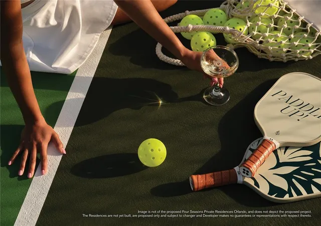 a bedroom with bed and a window