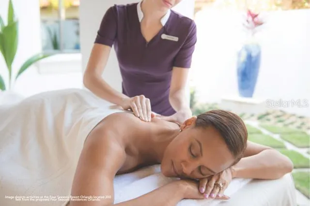 a view of a dinning table and chairs in a patio