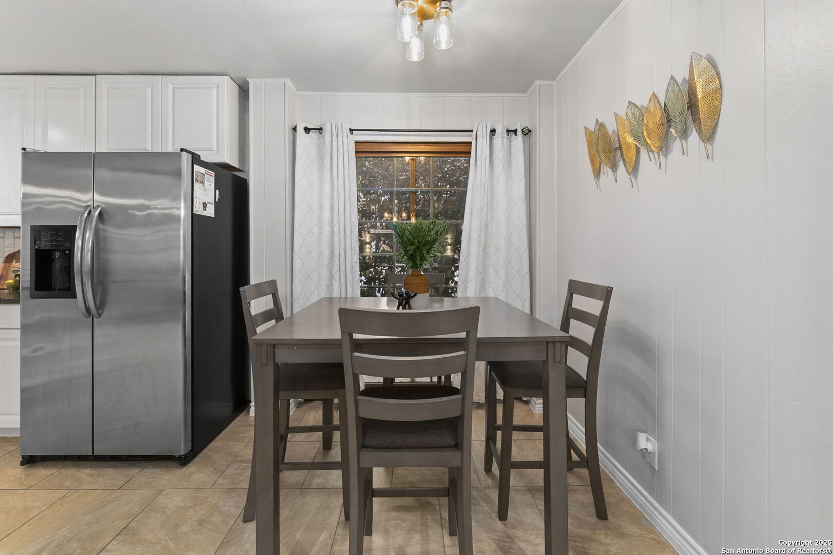 5203 Metcalf Windcrest, TX 78239 - Photo 12 of 37 a dining room with furniture and window