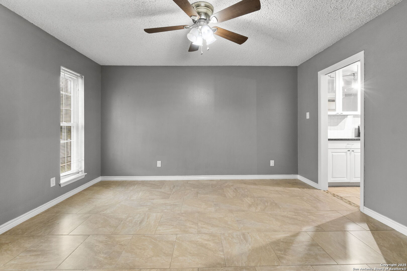 5203 Metcalf Windcrest, TX 78239 - Photo 17 of 37 a view of an empty room with a window
