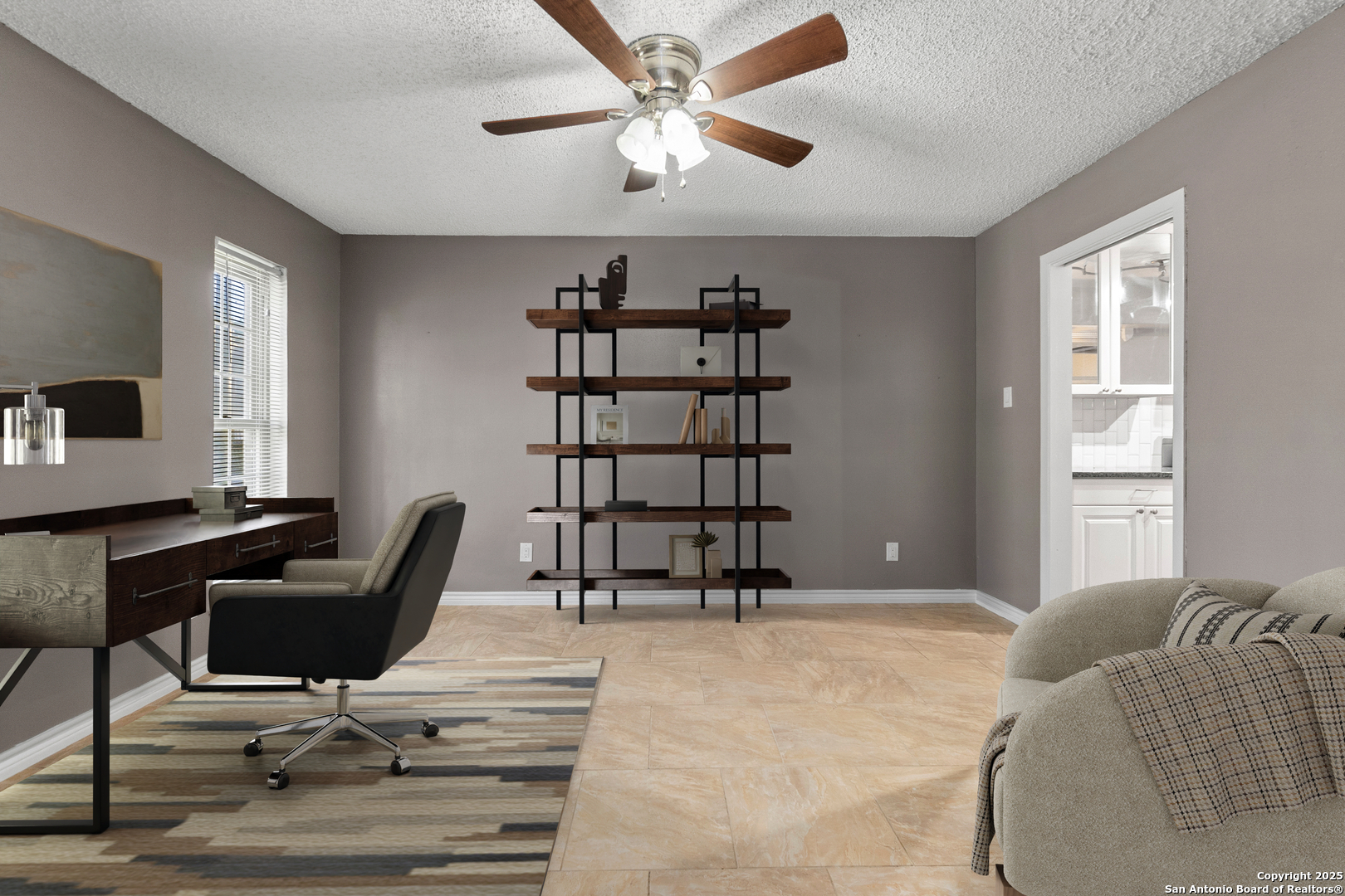 5203 Metcalf Windcrest, TX 78239 - Photo 18 of 37 a view of a livingroom with workspace and a window