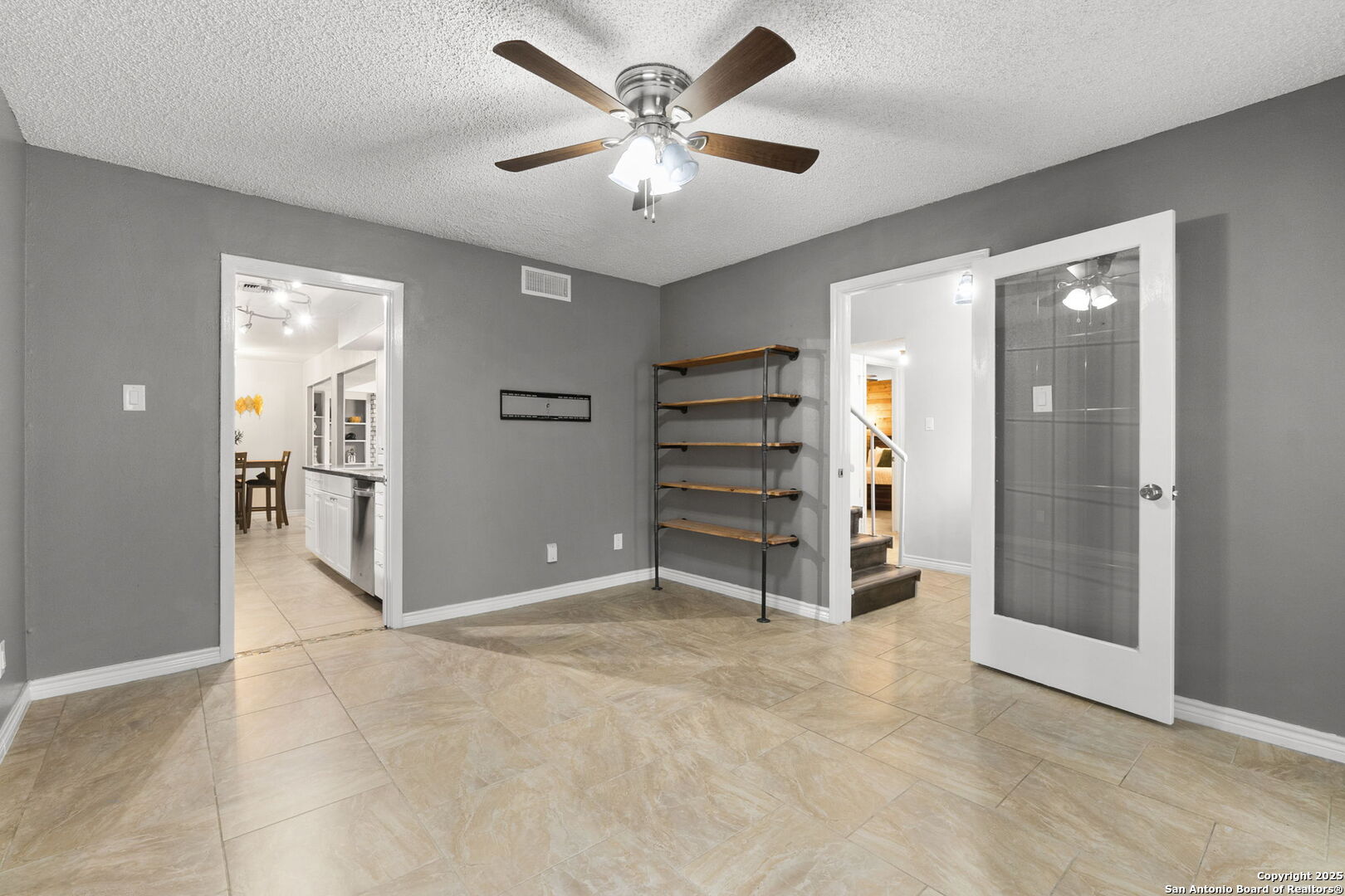 5203 Metcalf Windcrest, TX 78239 - Photo 19 of 37 an empty room with closet and a ceiling fan