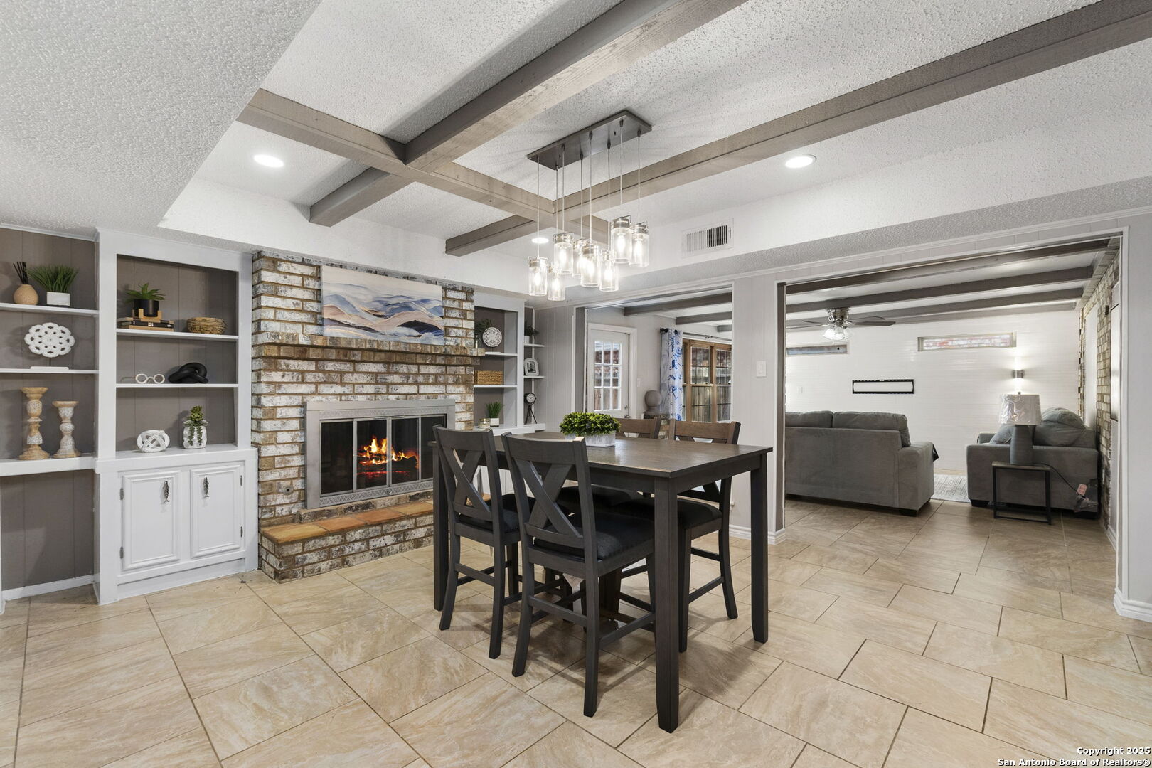 5203 Metcalf Windcrest, TX 78239 - Photo 9 of 37 a view of a livingroom with furniture and a fireplace